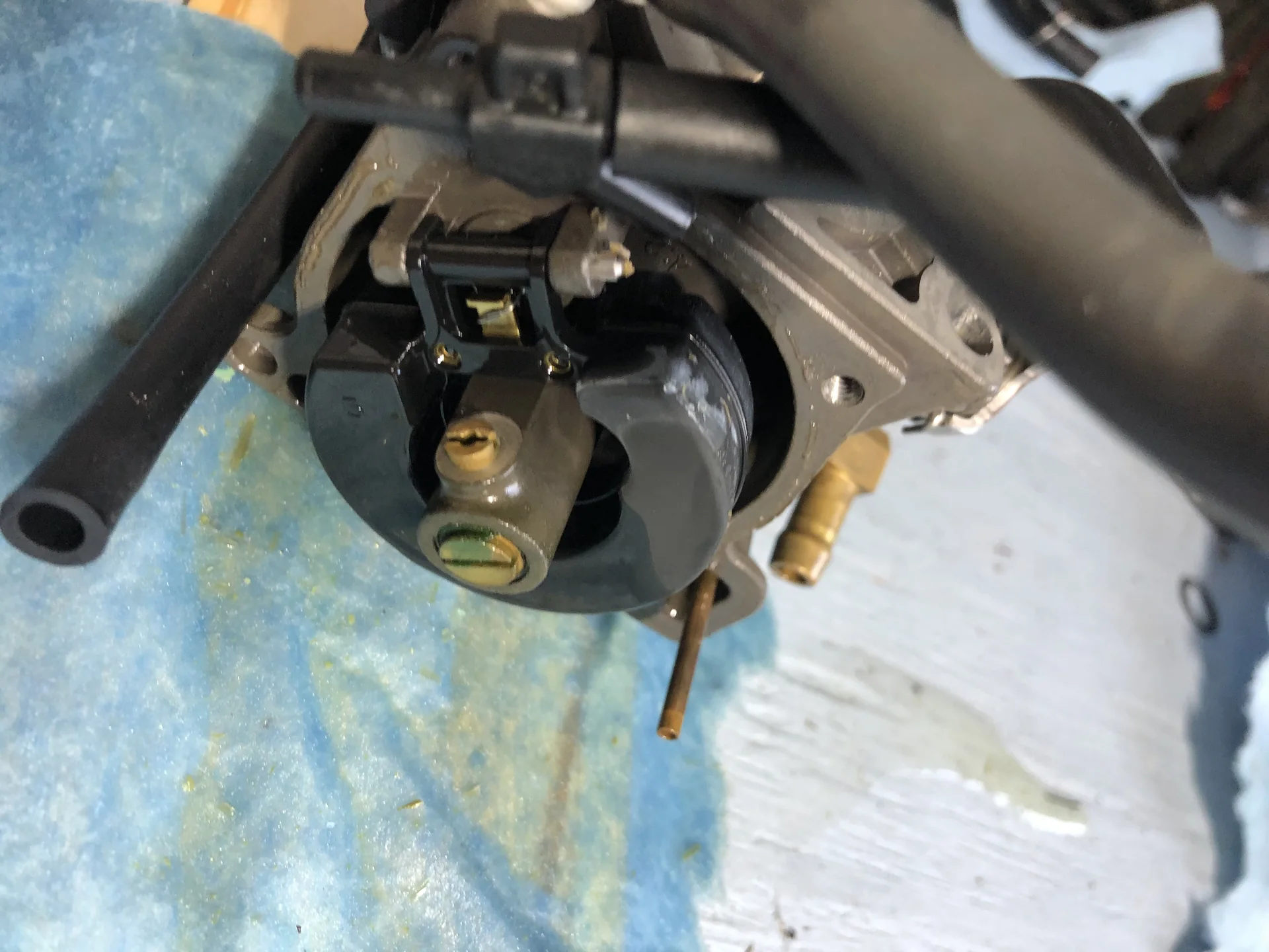 Marine carburetor opened for cleaning and service