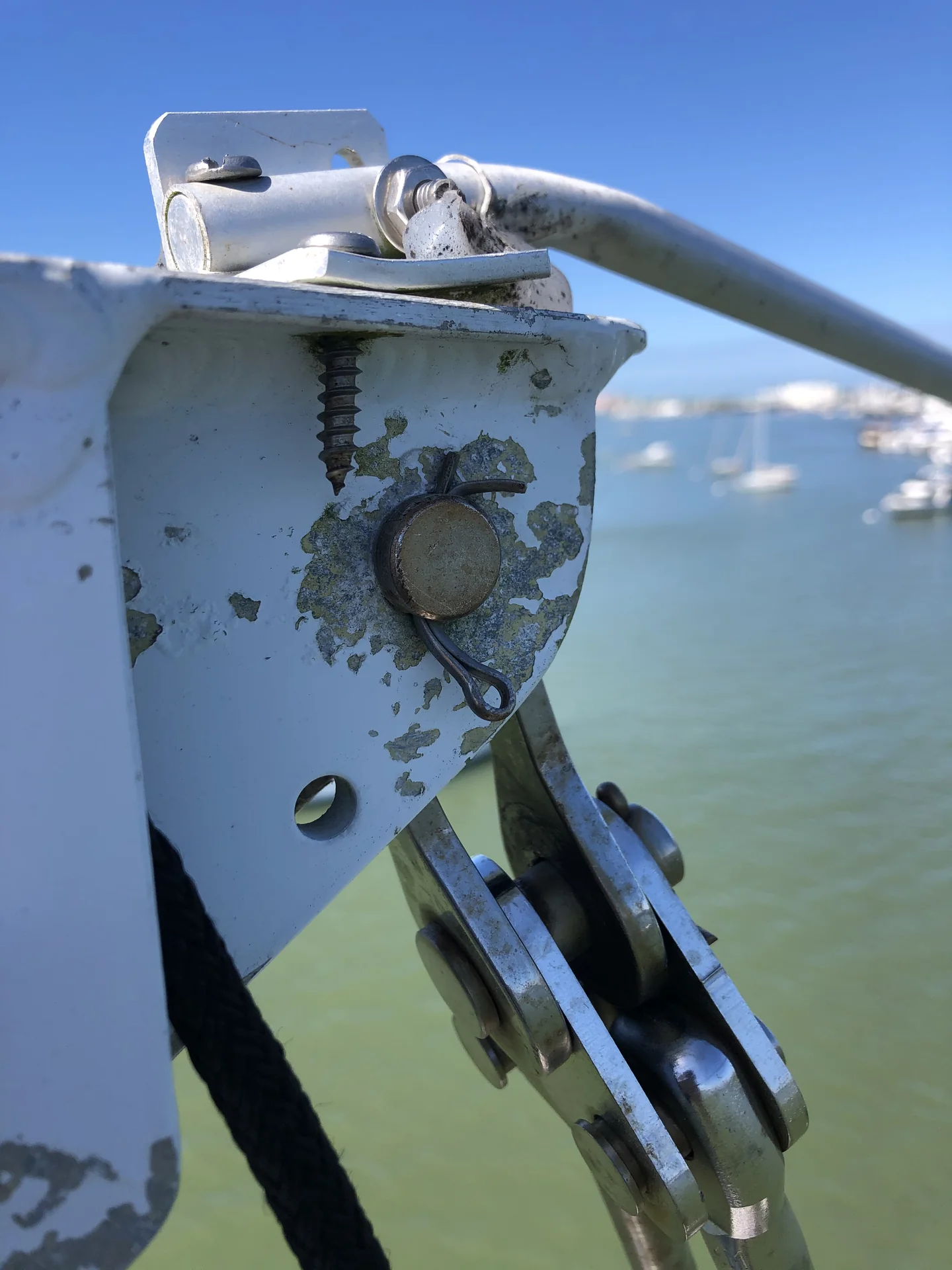 Worn sailboat rigging attachment hardware documented during inspection