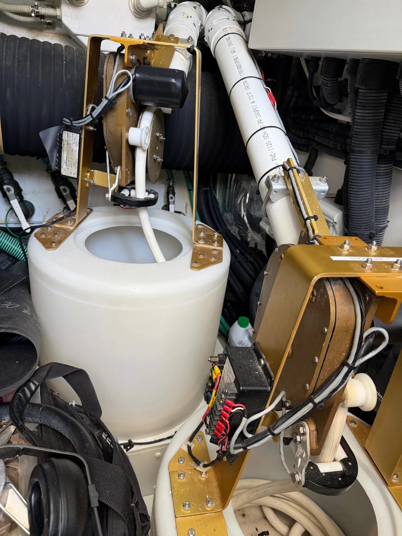 Two Glendinning CableMaster retrieval drums and cable bins installed in a vessel machinery compartment