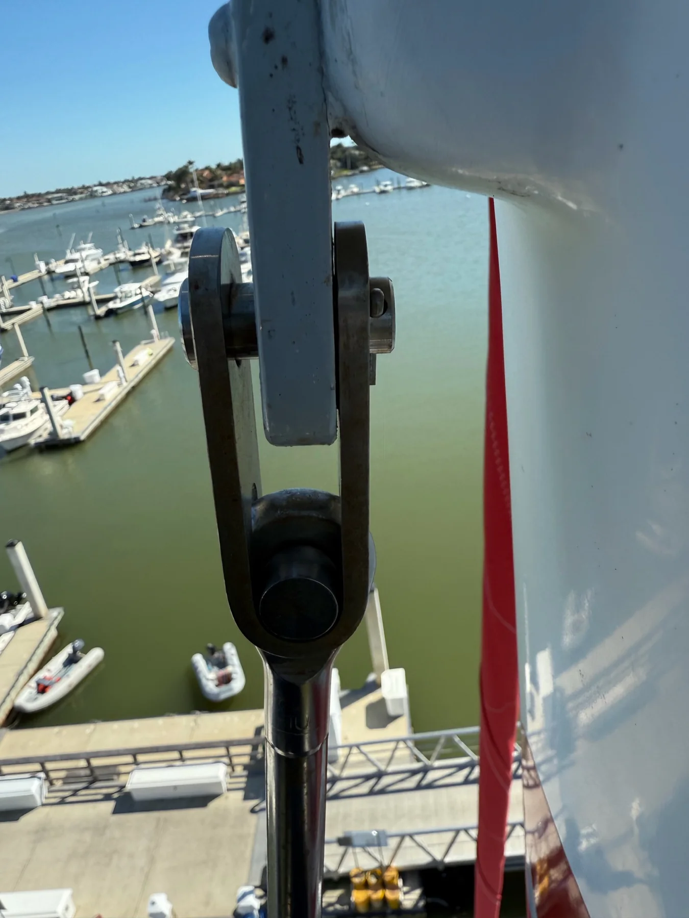Stainless steel toggle and clevis pin connecting standing rigging to a mast tang
